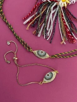 Digital Dress Room Ad Gold Plated Evil Eye Rakhi Thread & Bracelet For Bhaiya-Bhabhi (Pack Of 2)