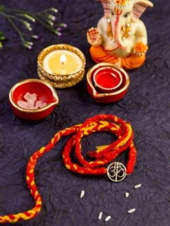 Curio Cottage Om Rakhi