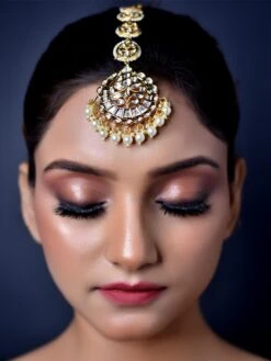 AG'S Yashwini Pearl White Kundan Gold Plated Teeka