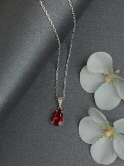 CLARA Silver Rhodium Plated Swiss Zirconia Blood Red Tear Drop Pendant With Chain For Women & Girls