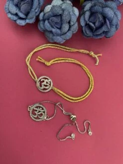 Digital Dress Room American Diamond Om Designer Silver Rakhi Bracelet For Brother-Bhabhi (Pack Of 2)