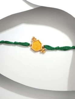 Suhani Pittie Gold Tone Raw Silk Rakhi