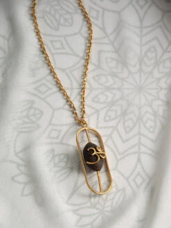 Suhani Pittie Gold Plated Lumba Rakhi With An Om Embellished Kamal Ghatta